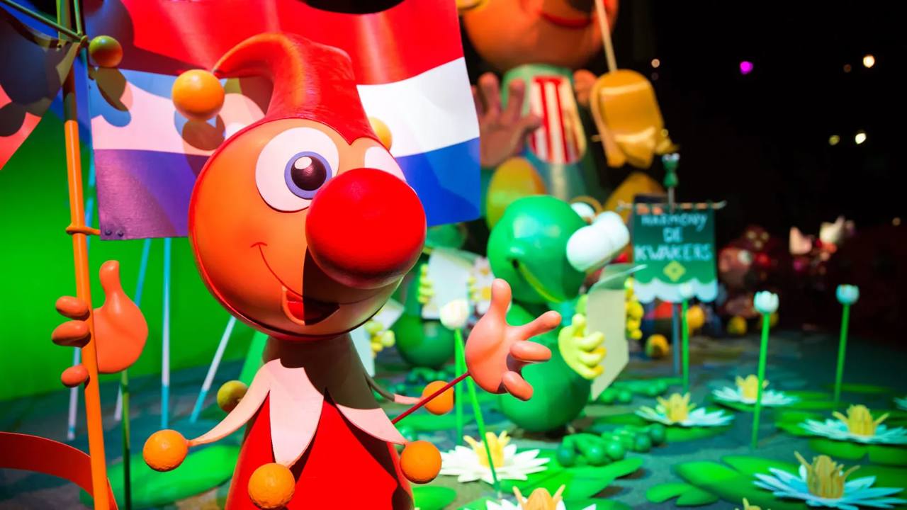 Jokie welcomes visitors in a colourful scene from Carnaval Festival.