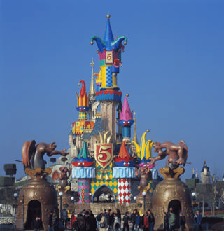Sleeping Beauty Castle dressed as a carnival jester for the fifth anniversary in 1997