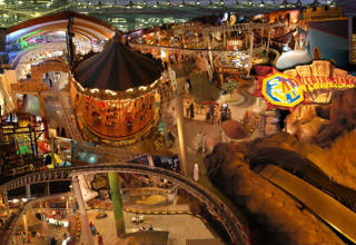 An overhead view across Adventureland’s interwoven rides and walkways.