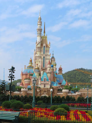 Castle of Magical Dreams rises in front of Lantau’s green hills