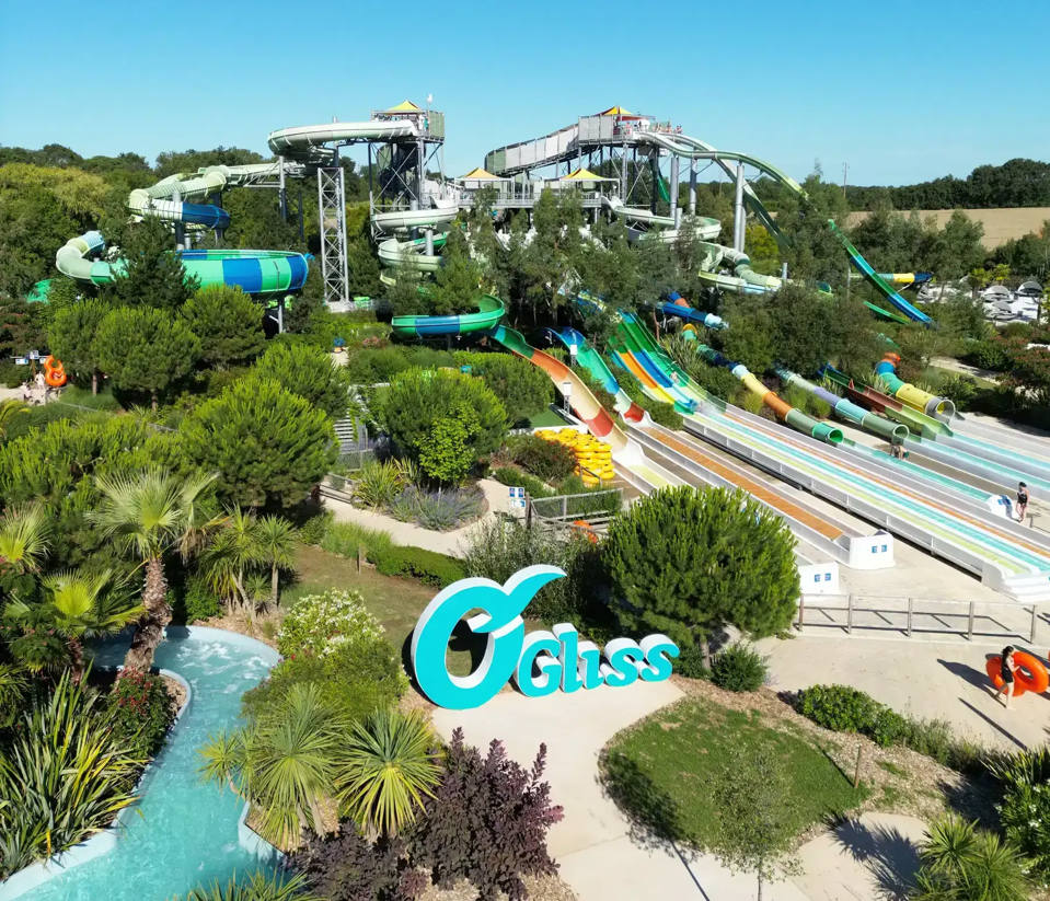 Aerial view of OʼGliss Parkʼs pools, slides and landscaped areas.