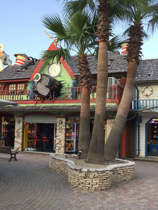 Palms before the maritime façades and arcade