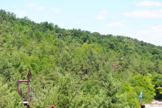Serpa Kalandpark adventure course among the trees.
