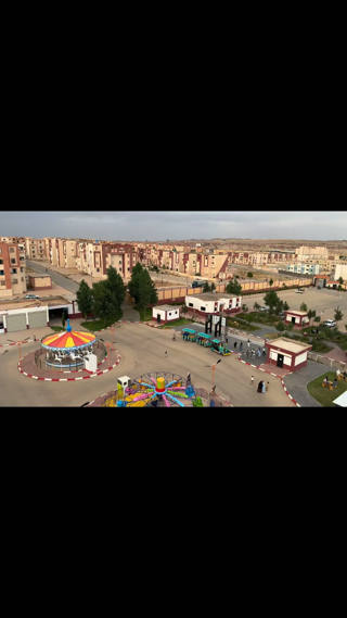 Carrusel, tren pequeño y atracciones en Al-Qidah Park